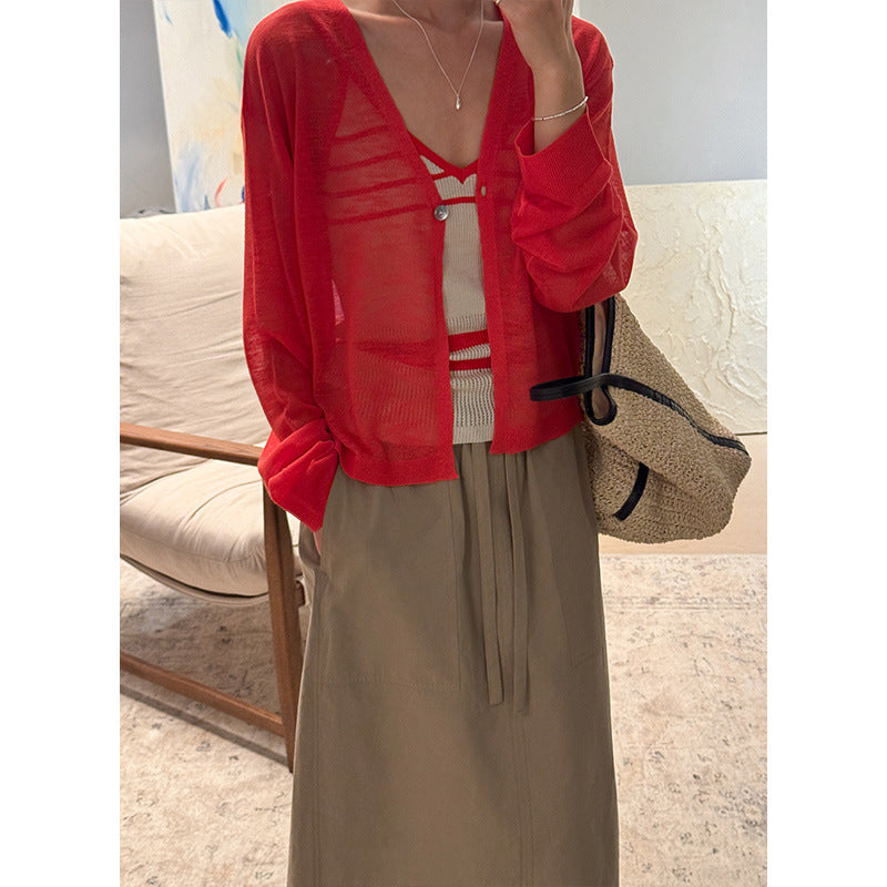 Dame cropped strikjakke med V-udskæring og knapdetaljer Stilla