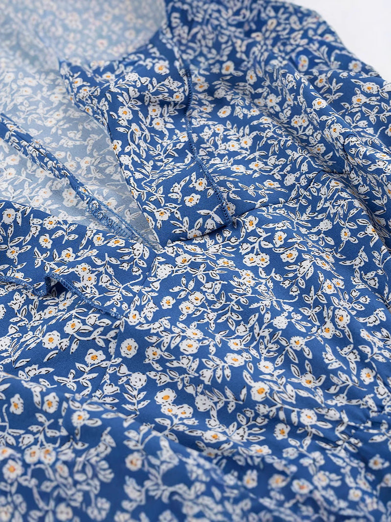 Dame jumpsuit med legende flæse-design og blomstermønster Stilla