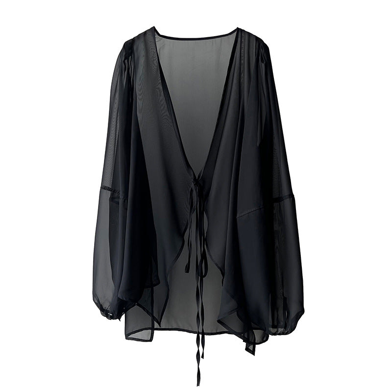 Dame elegant gennemsigtig bluse med dyb V-hals og bindebånd Stilla