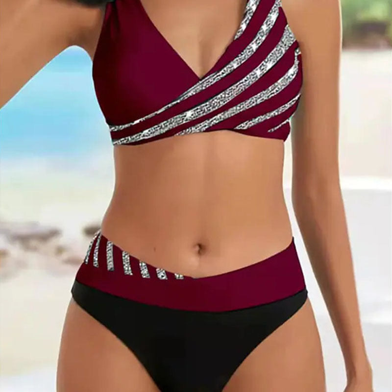 Dame bikinisæt med asymmetrisk snit og trendy striber Stilla