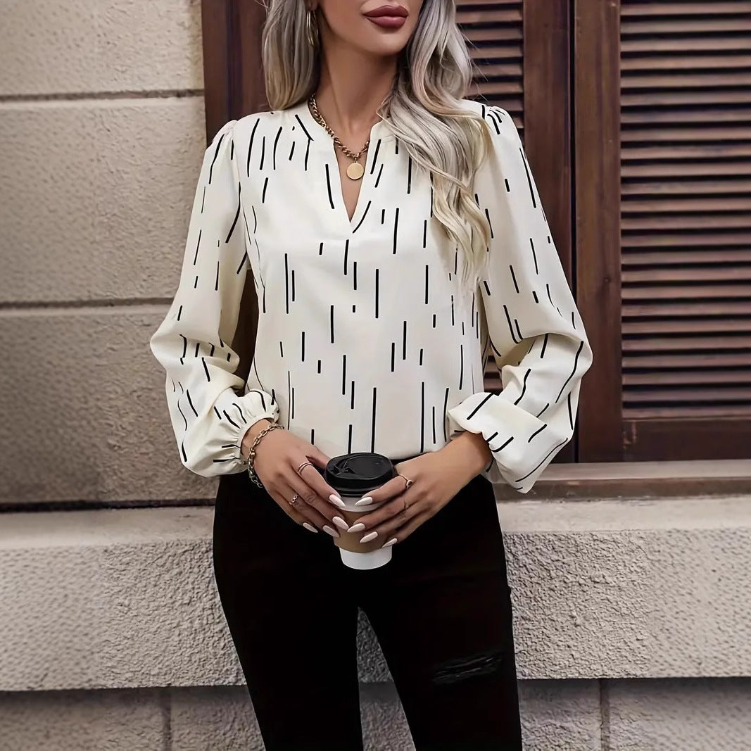 Dame eksklusiv stribet bluse med V-udskæring og ballonformede ærmer Stilla