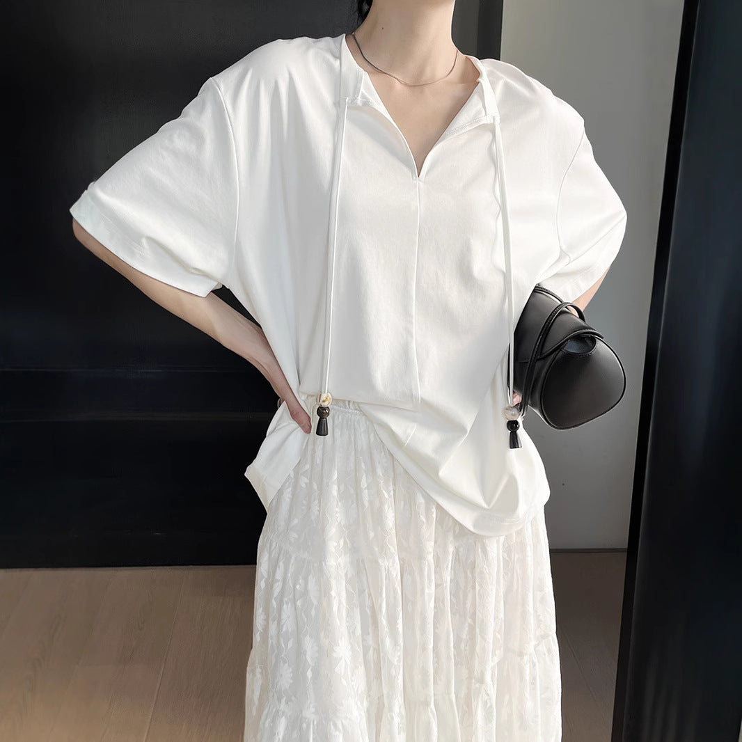 Dame afslappet kortærmet skjorte med hætte og justerbar kant Stilla