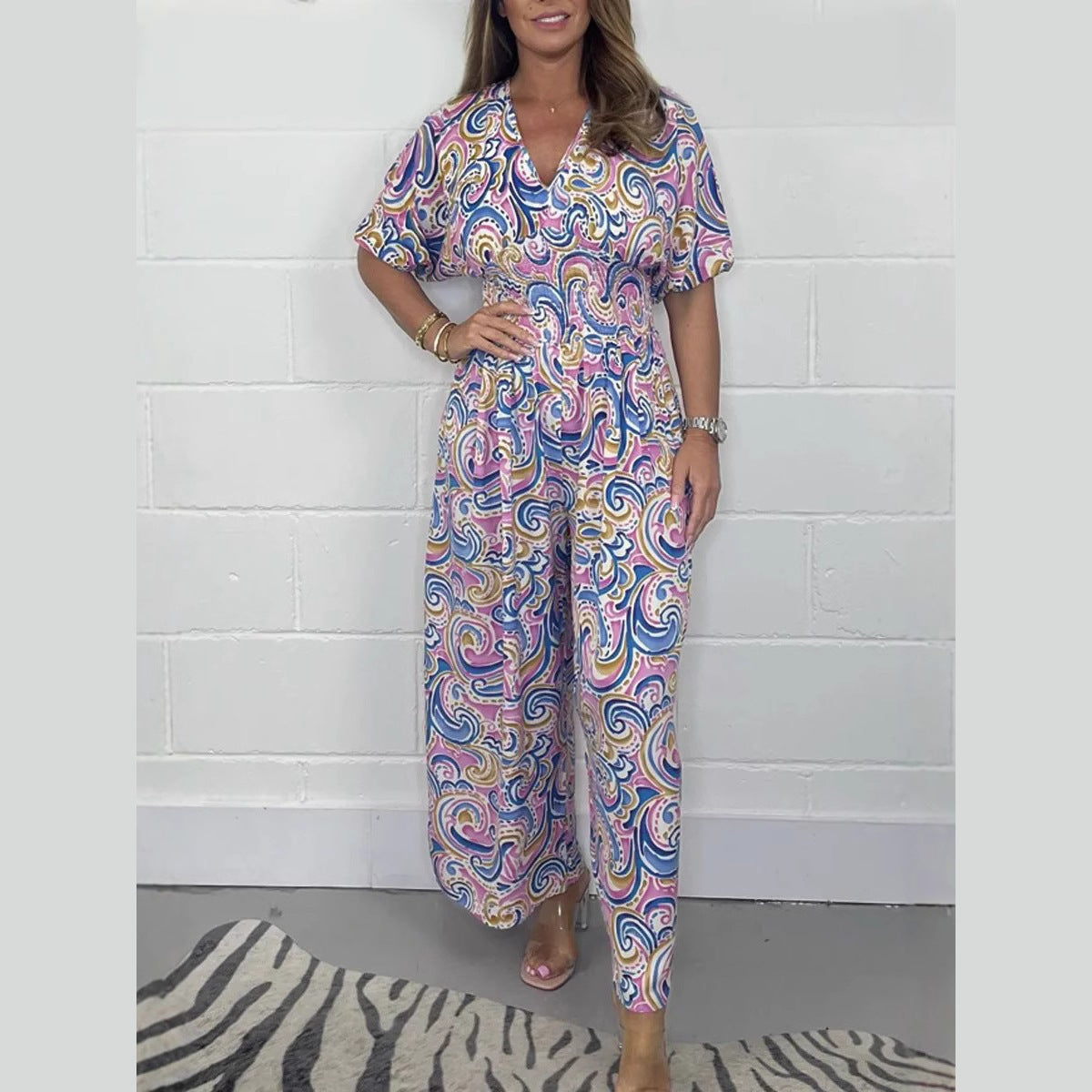 Dame Elegant Jumpsuit med brede ben og dyb V-hals Stilla