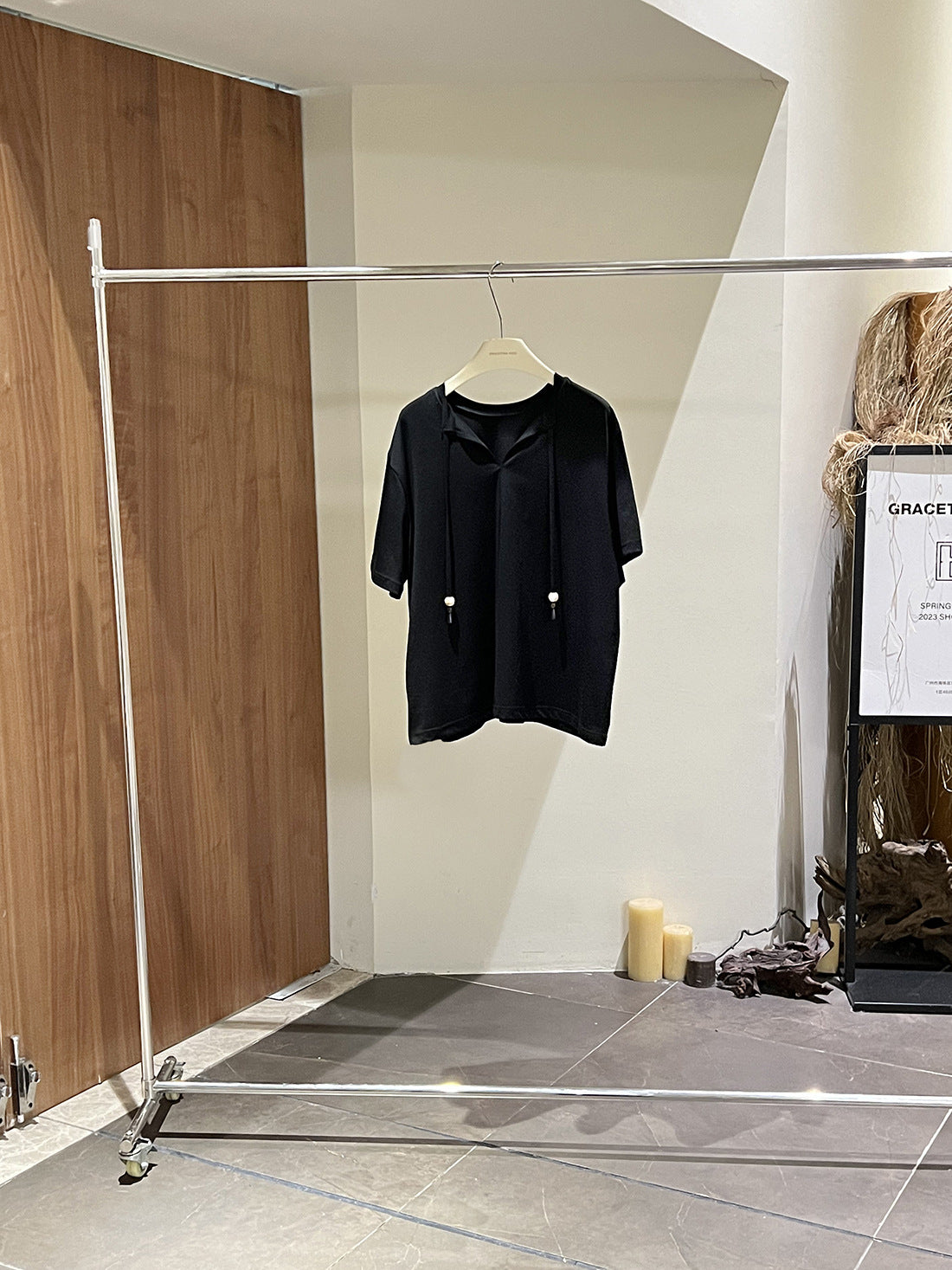 Dame afslappet kortærmet skjorte med hætte og justerbar kant Stilla