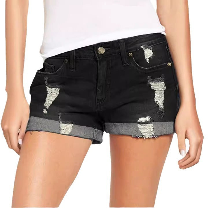Dame Destroyed Denim-Shorts med omfoldet kant og trendy dekorationer Stilla