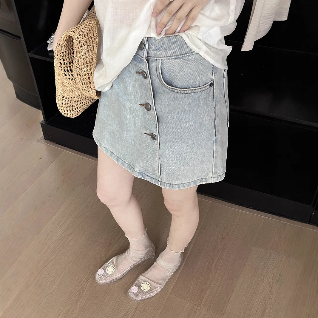 Dame Denim-shorts med knaplukning og let vintage-look Stilla