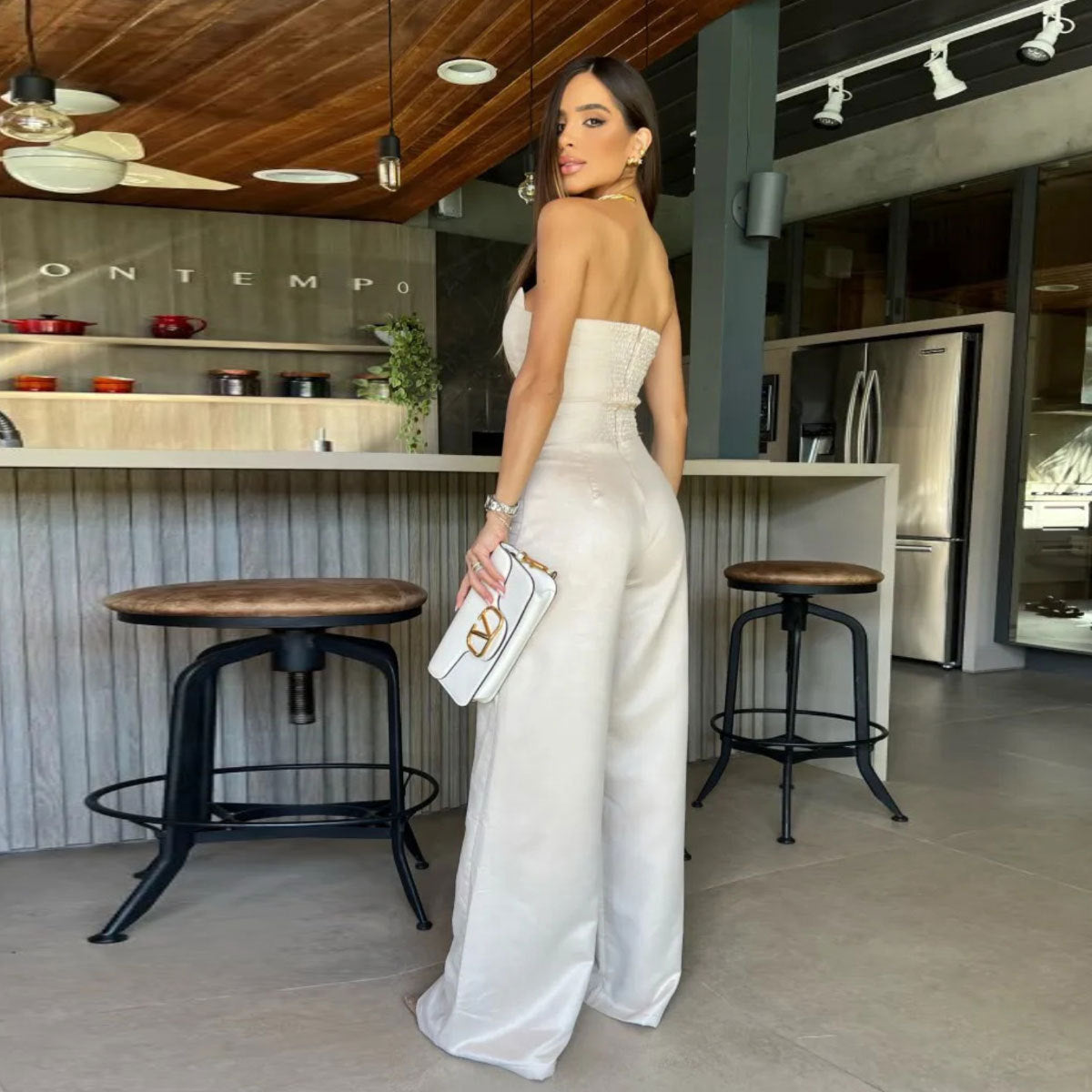 Dame Jumpsuit med elegant skulderfri design og kvalitets plisserede detaljer Stilla