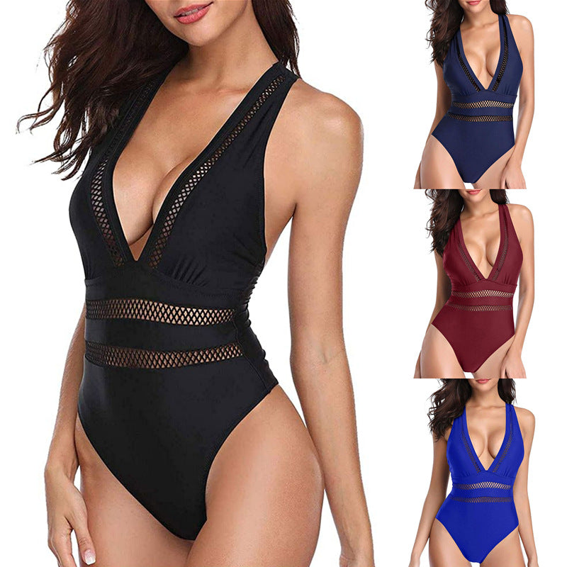 Dame jumpsuit badedragt med raffineret netdesign og dyb V-udskæring Stilla