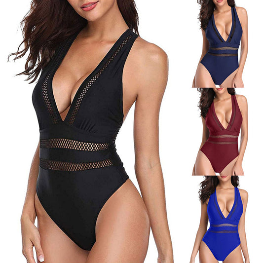 Dame jumpsuit badedragt med raffineret netdesign og dyb V-udskæring Stilla
