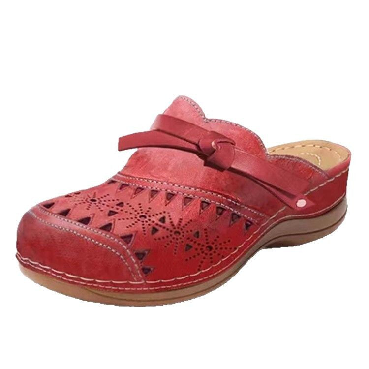 Dame Komfortable Clogs med filigran gennembruddesign og elegant rem Stilla