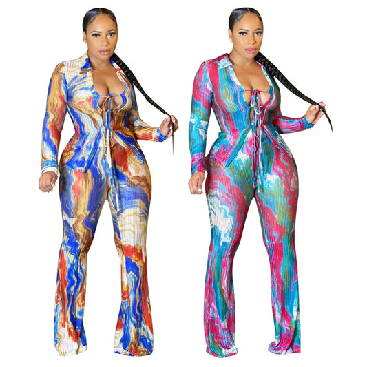 Dame gulvlængde jumpsuit med farverigt bølgemønster og snøre detaljer Stilla