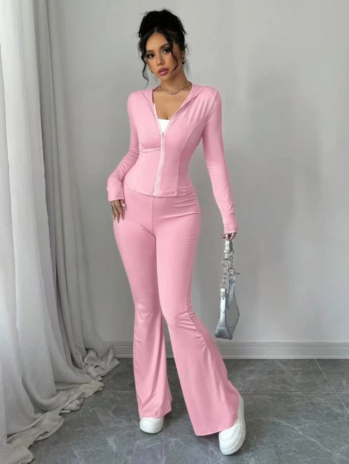 Dame Sporty Jumpsuit i elastisk materiale med lynlås Stilla