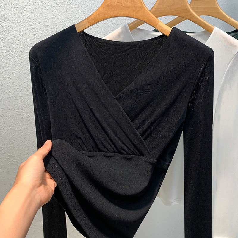 Dame elegant indpakningsbluse lavet af flydende materiale med raffinerede draperingsdetaljer Stilla