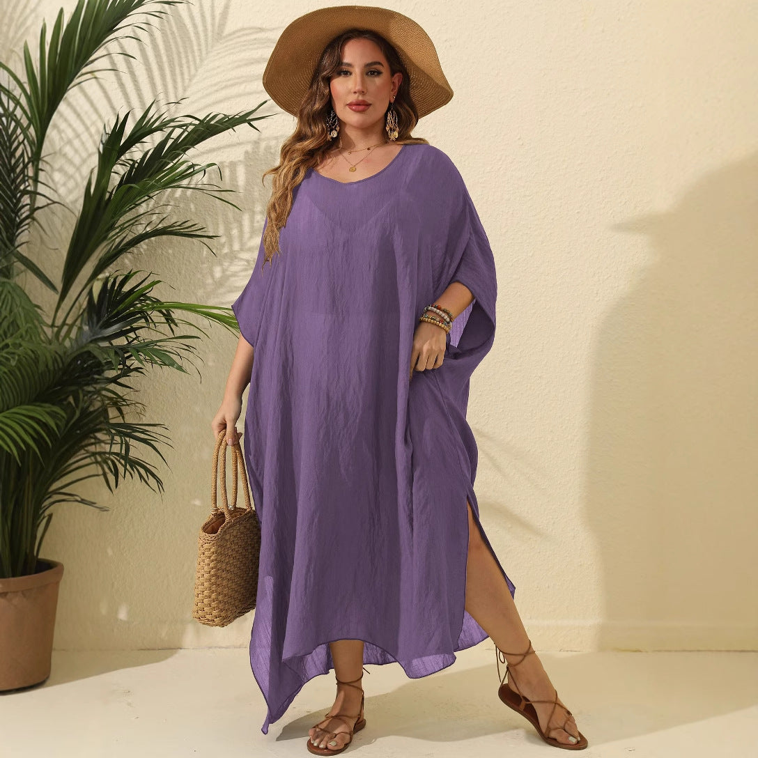 Dame afslappet strandkjole med asymmetrisk søm og praktiske sideslids Stilla