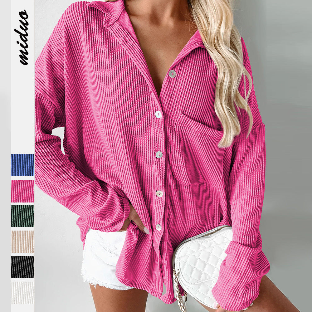 Dame afslappet langærmet bluse med struktureret design og praktisk brystlomme Stilla