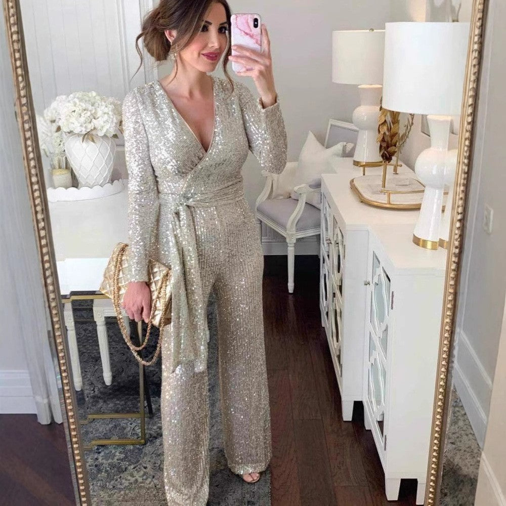 Dame Elegant og funklerende Jumpsuit med indpakningslook Stilla