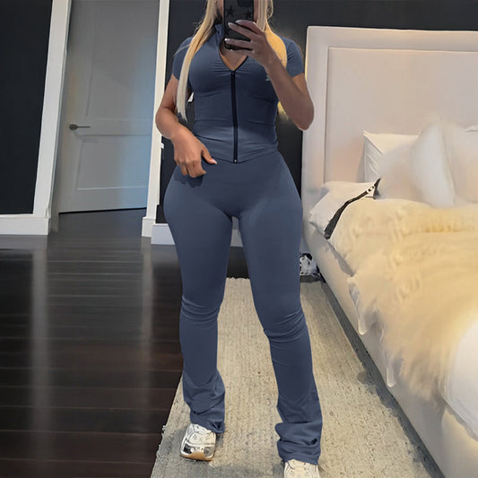 Dame figurtilpasset jumpsuit med kort arm og trendy zip-design Stilla