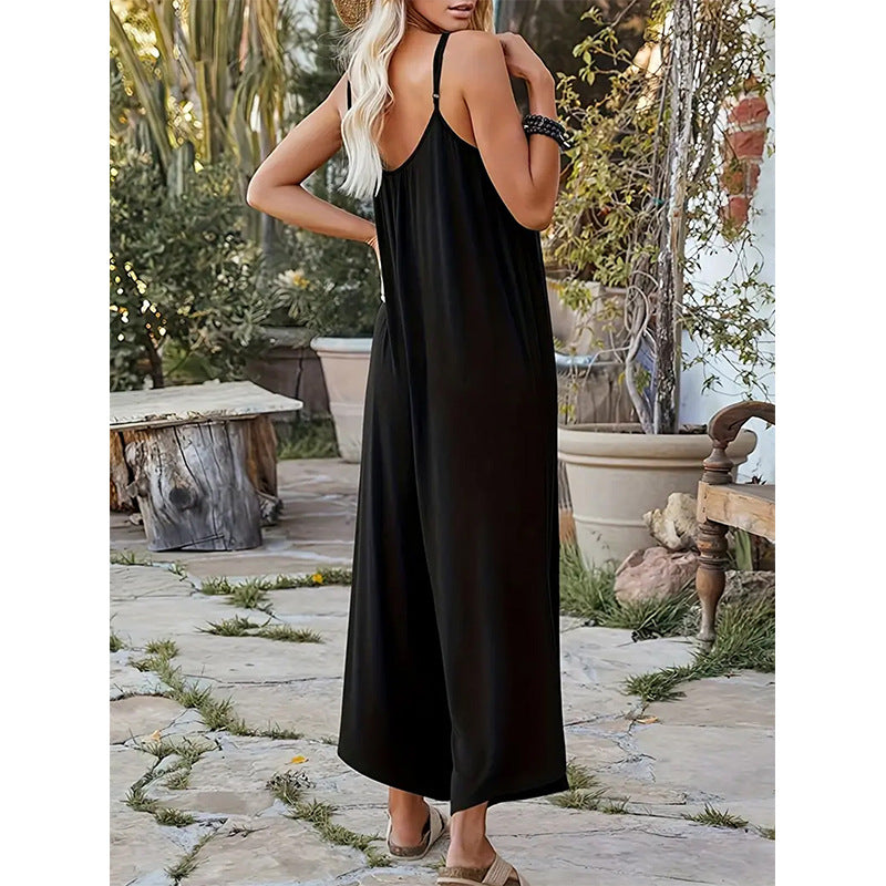Dame afslappet jumpsuit med dyb V-hals og praktiske lommer Stilla