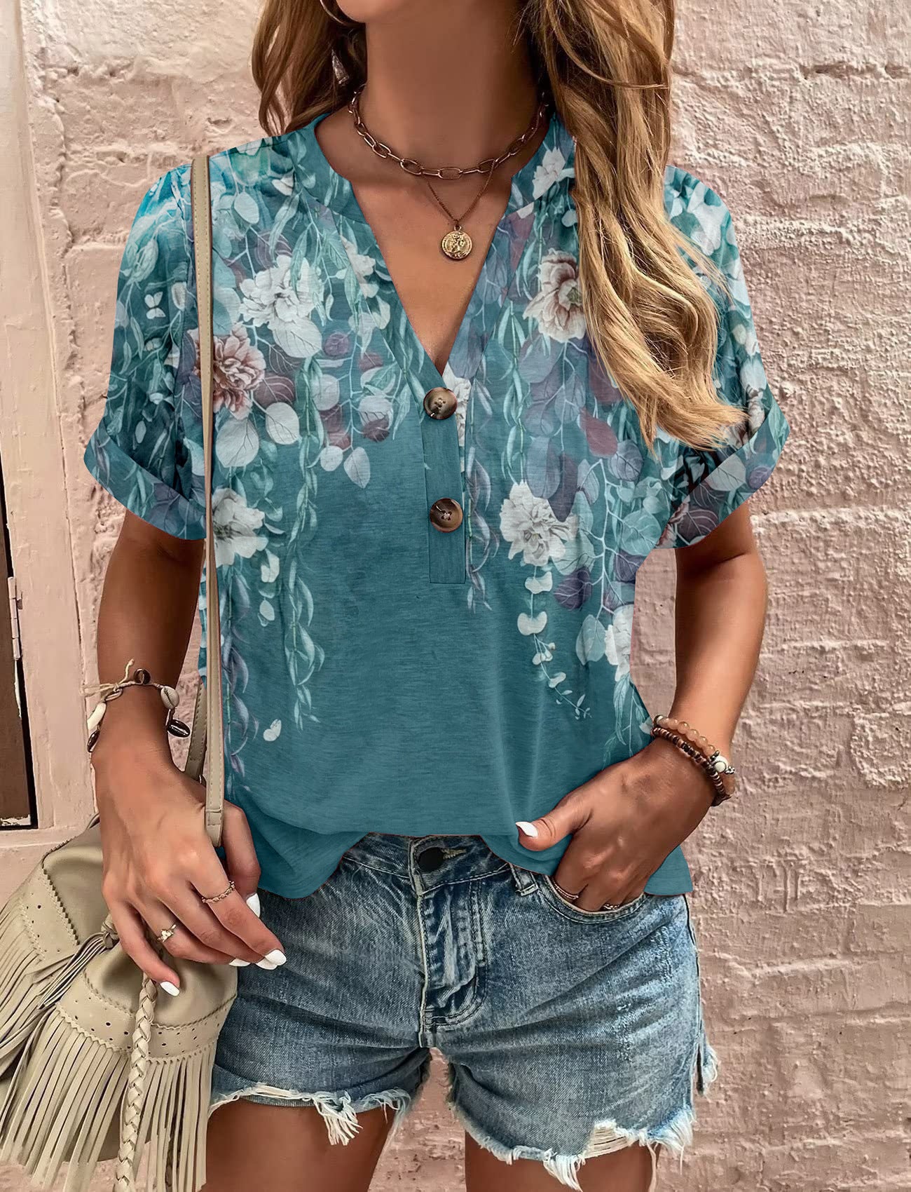 Dame afslappet kortærmet top med knaplukning og stribemønster Stilla