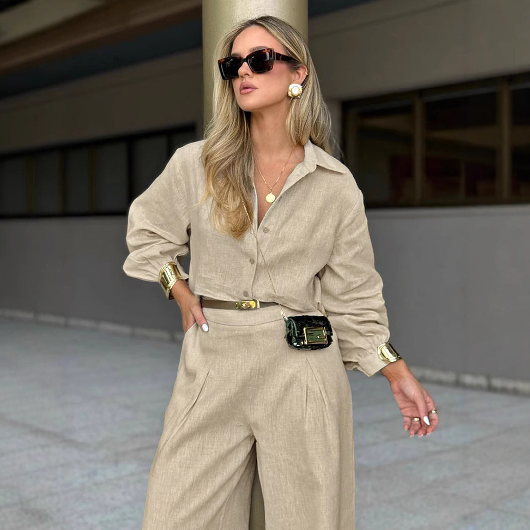 Dame elegant erhvervssæt med figursyet bluse og løst skåret bukser Stilla