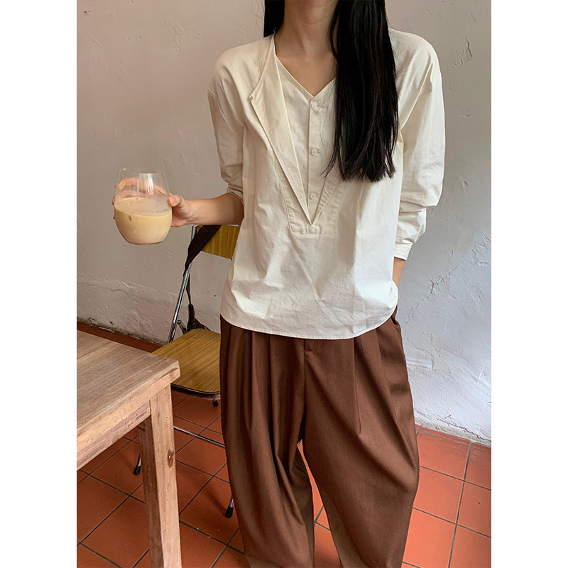 Dame afslappet langærmet skjorte med struktureret udskæring og knapdetaljer Stilla