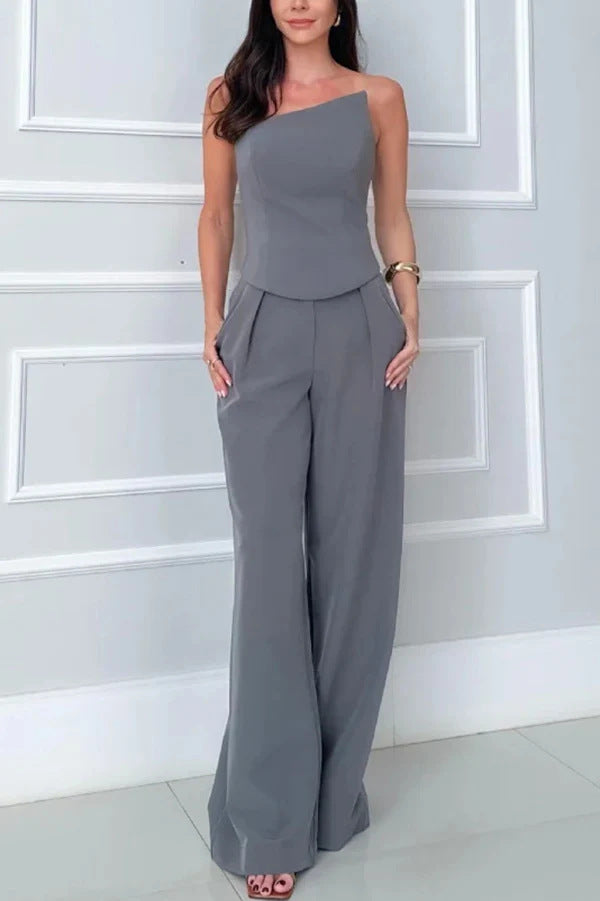 Dame Elegant jumpsuit med asymmetrisk skæring og bredt ben Stilla