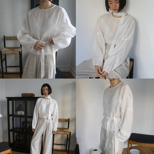 Dame afslappet indpakningsoverdel med elegant design og taljerbar bælte Stilla