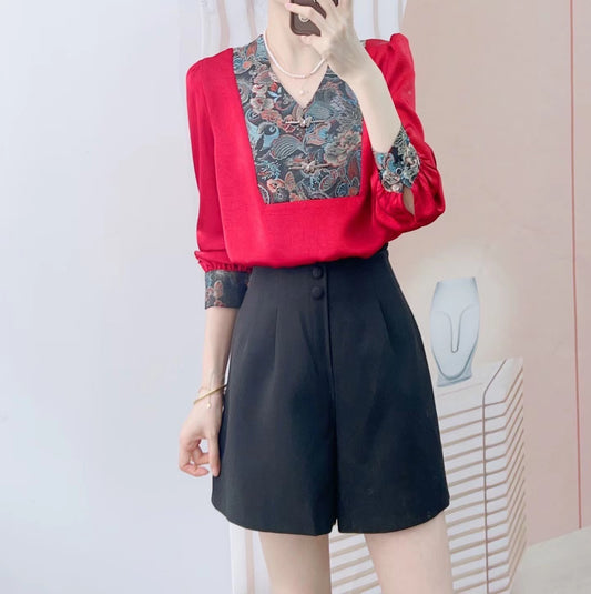 Dame Elegant Bluse med blomstret design og feminine pufærmer Stilla