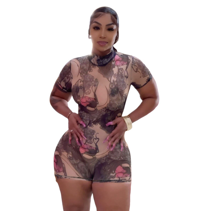 Dame figursyet kort jumpsuit med høj krave og blomstret design Stilla