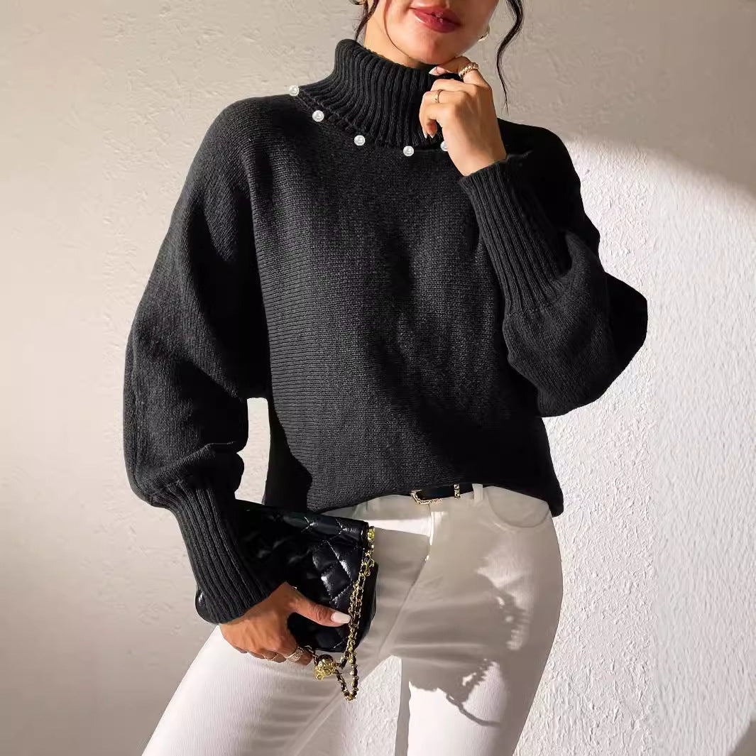 Dame afslappet rullekravepullover med dekorative perledetaljer og bred pasform Stilla