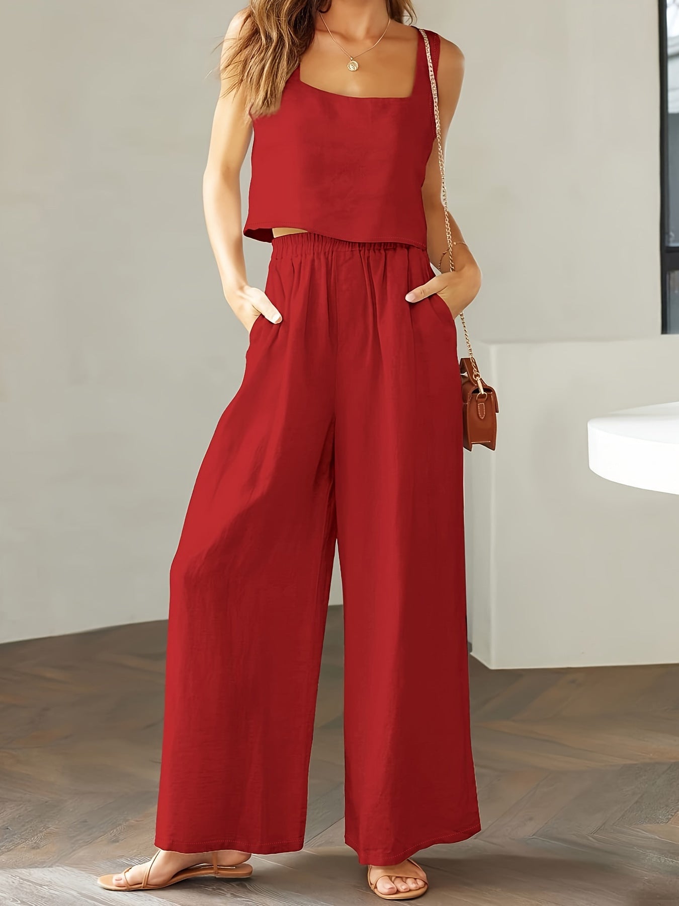 Dame-jumpsuit med bredt ben og justerbare stropper Stilla
