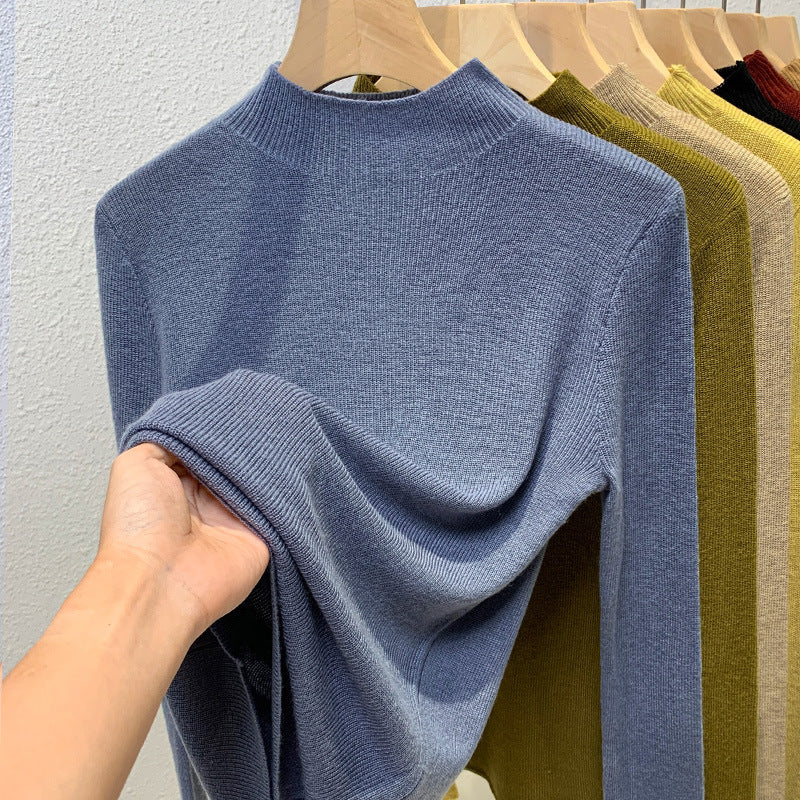 Dame pullover med høj ståkrave og fin ribstruktur Stilla