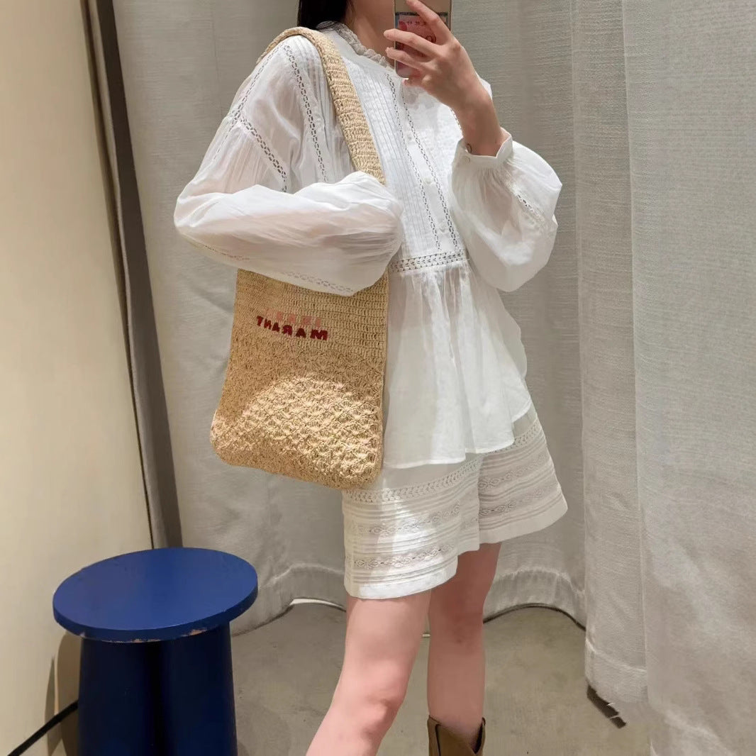 Dame elegant bluse med struktureret design og botaniske accenter Stilla