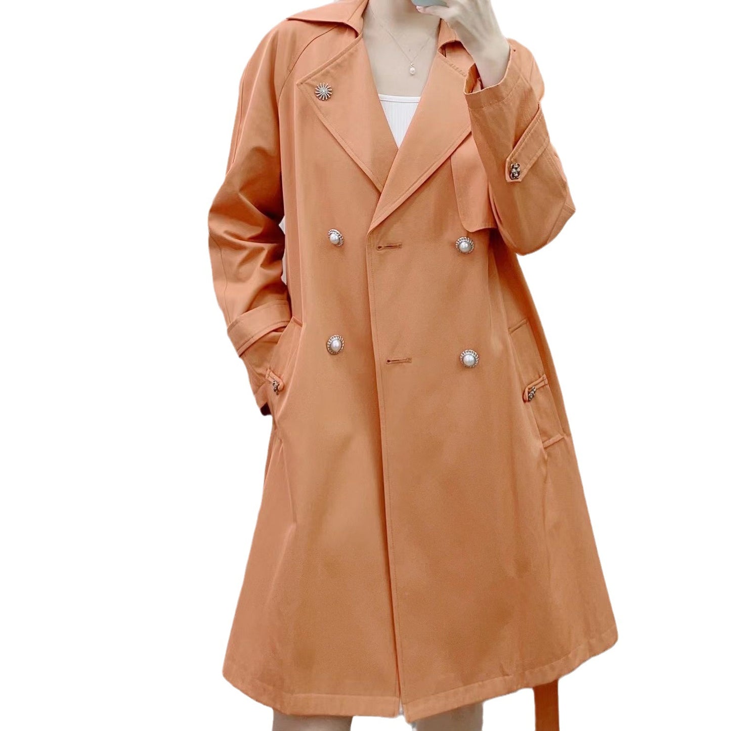 Dame dobbeltspændt trenchcoat med stilfulde knapdetaljer og praktiske lommer Stilla