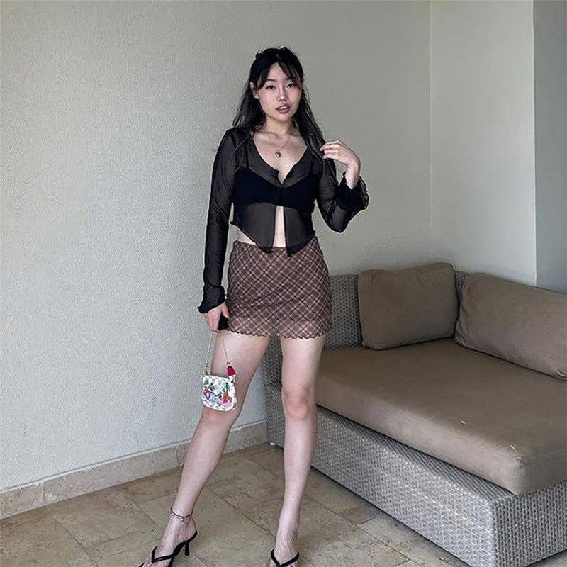 Dame cropped gennemsigtigt overdel med lange ærmer og unikt snit Stilla