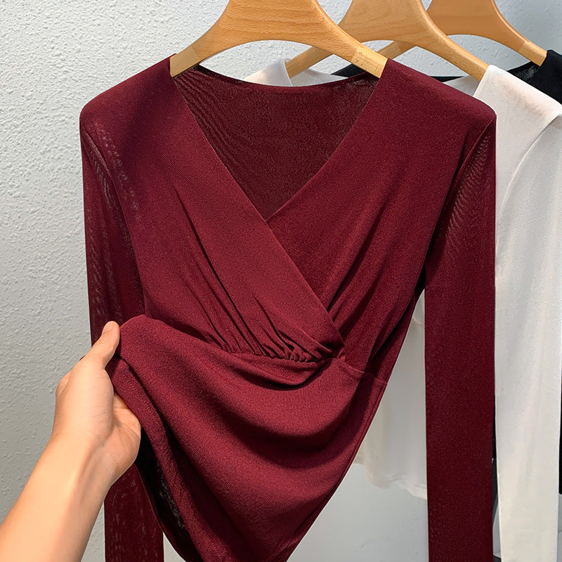 Dame elegant indpakningsbluse lavet af flydende materiale med raffinerede draperingsdetaljer Stilla