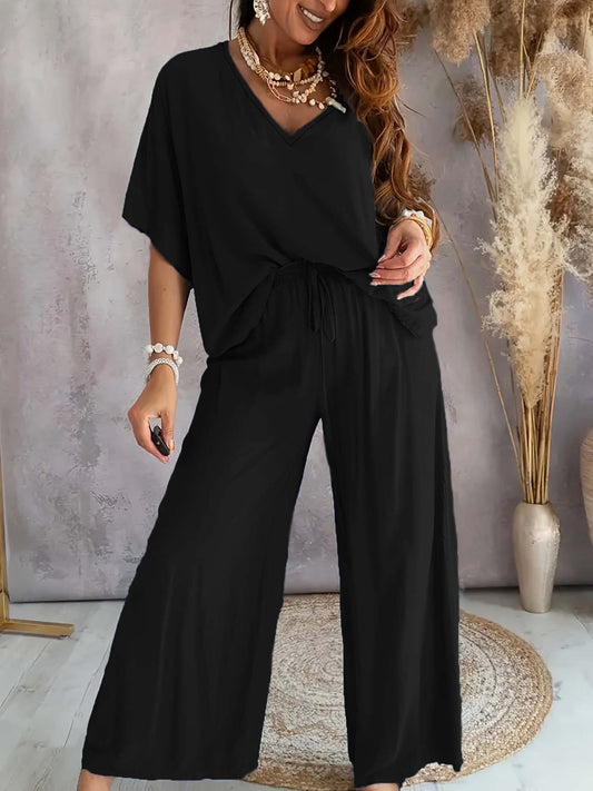 Dame Komfortabel Jumpsuit med V-udskæring og elastisk talje Stilla
