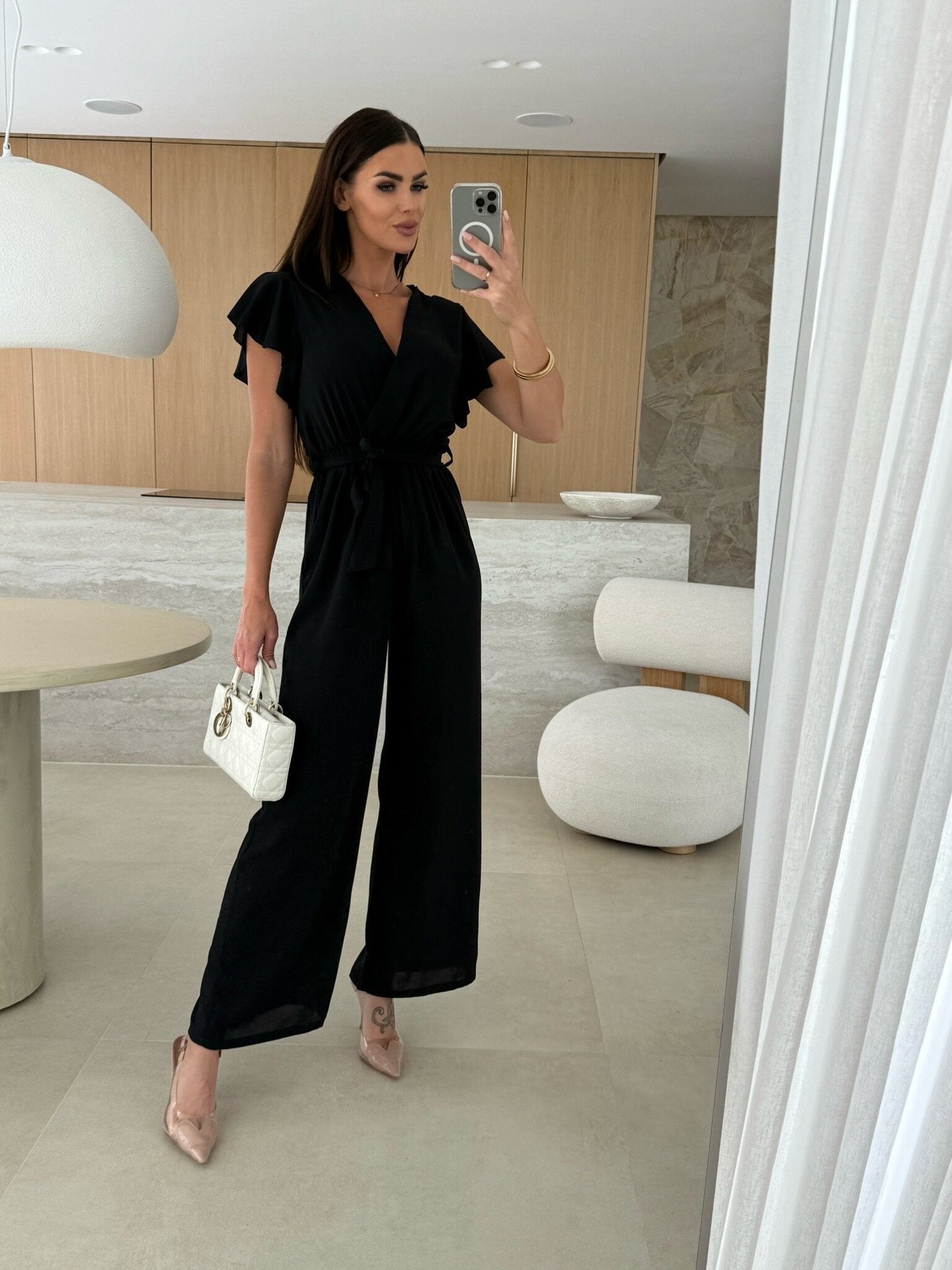 Dame elegant jumpsuit med indviklet udseende og flæseærmer Stilla