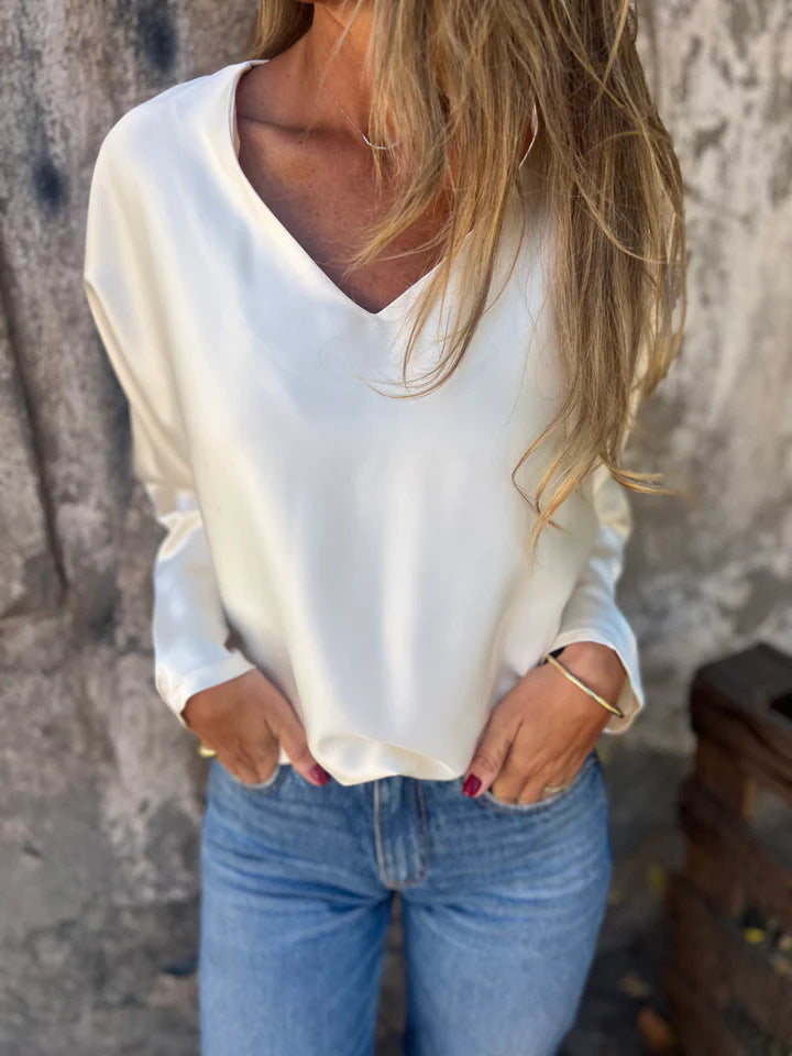 Dame afslappet bluse med dyb V-udskæring og bred pasform Stilla