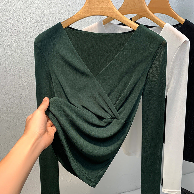 Dame elegant indpakningsbluse lavet af flydende materiale med raffinerede draperingsdetaljer Stilla