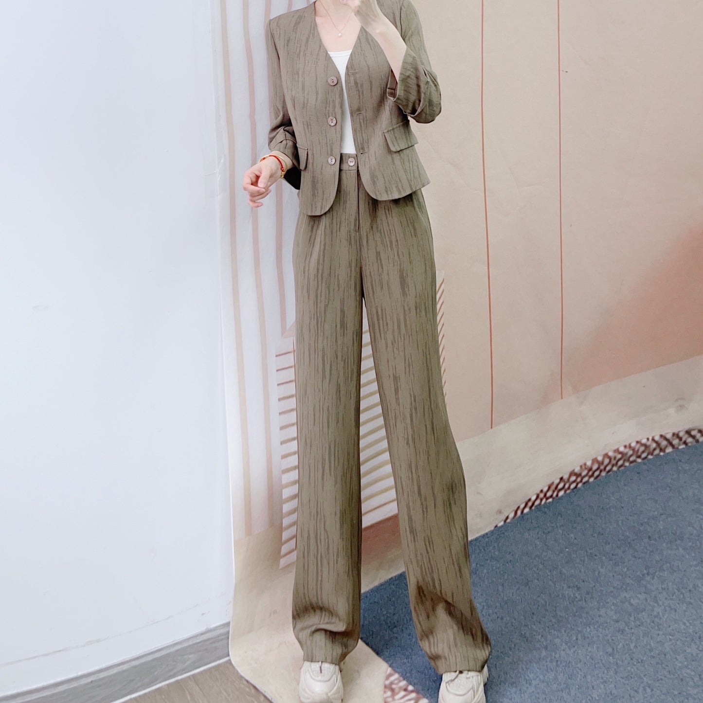 Dame elegant blazer-bukser sæt med smal pasform og dekorative knapdetaljer Stilla