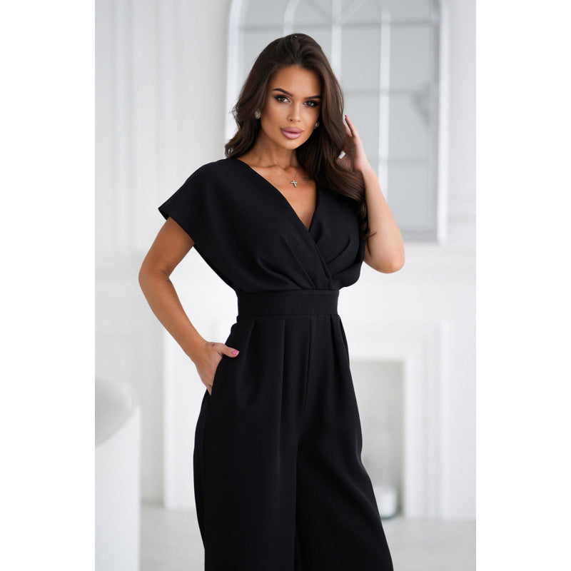 Elegant dame-jumpsuit med brede ben og draperede ærmer Stilla