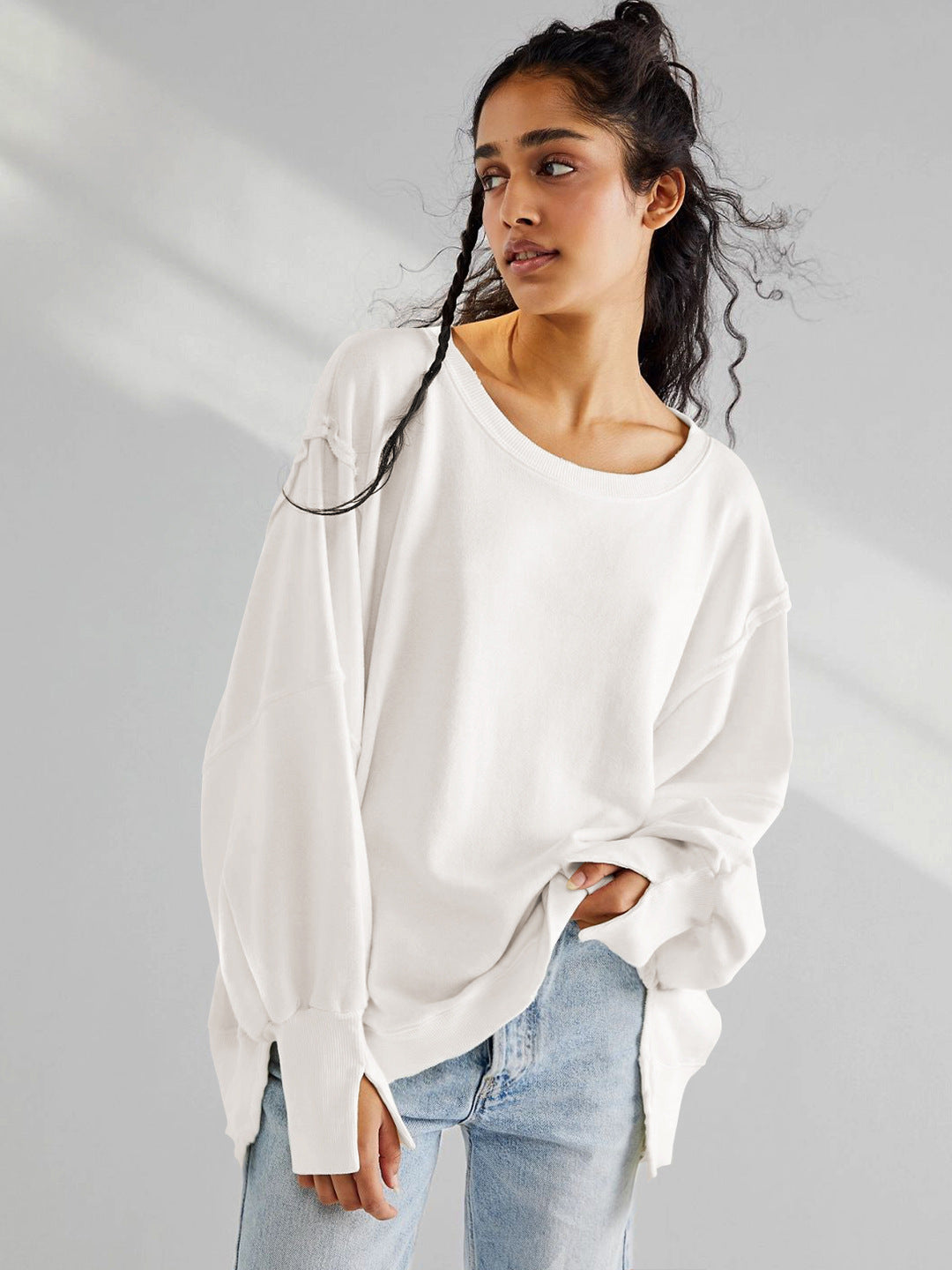 Dame afslappet oversized pullover med innovativt snit og fast stof Stilla