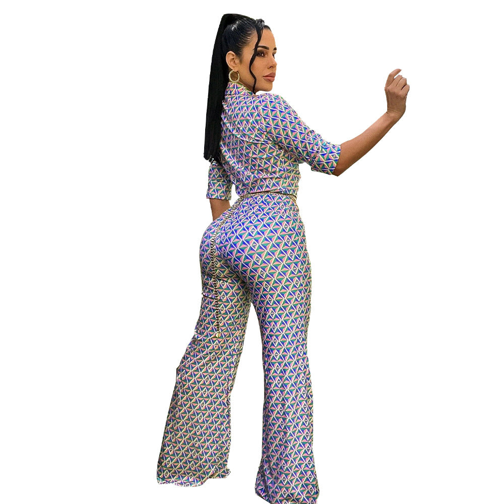 Dame jumpsuit med geometrisk design og smart taljebælte Stilla