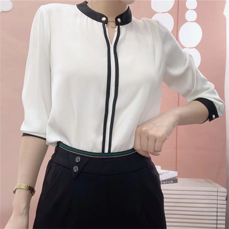 Dame elegant bluse med kontrasterende krave og knapdetaljer Stilla