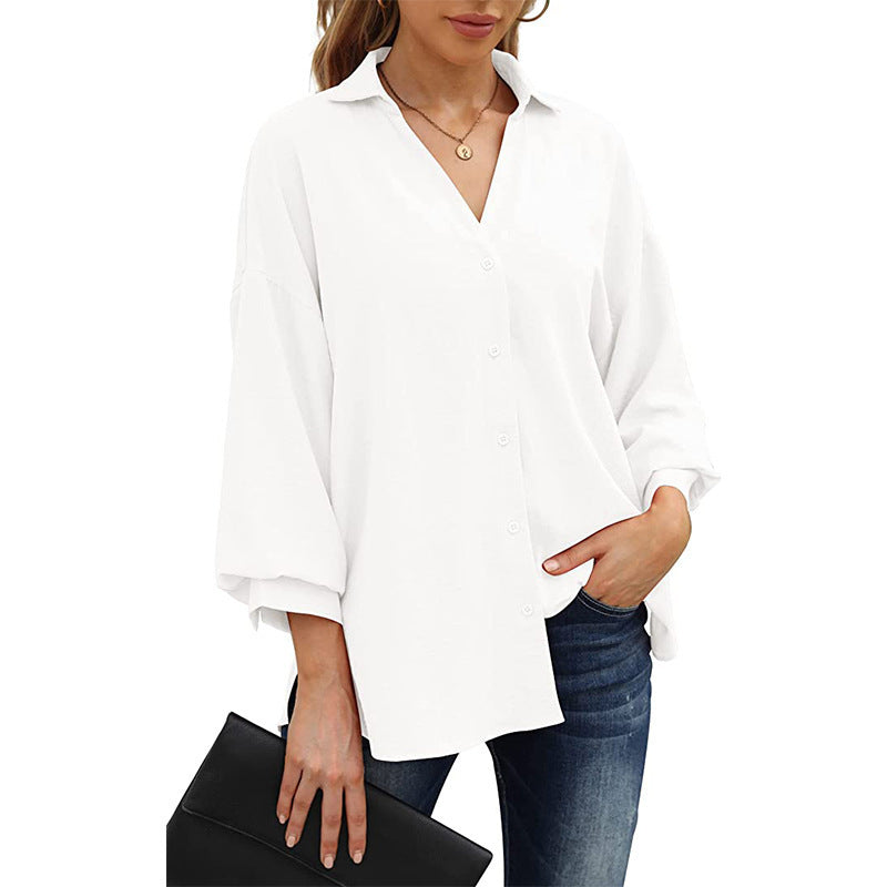 Dame afslappet bluse med overdimensionerede ærmer og knaplukning Stiila