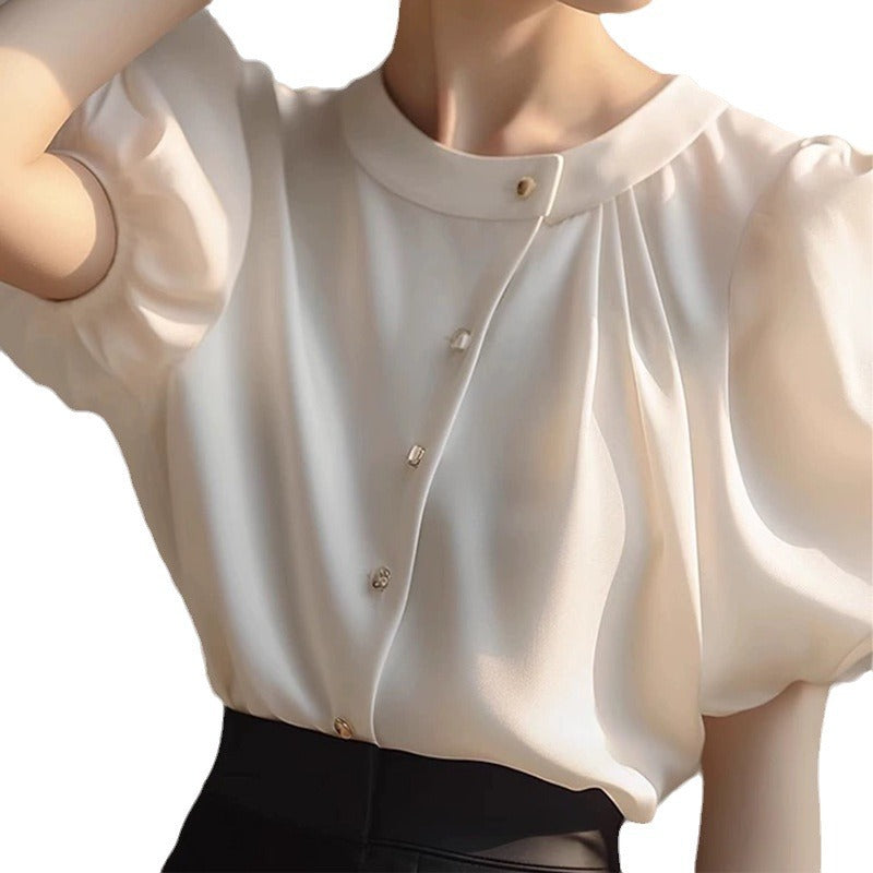 Dame elegant bluse med voluminøse ærmer og dekorative knapdetaljer Stilla