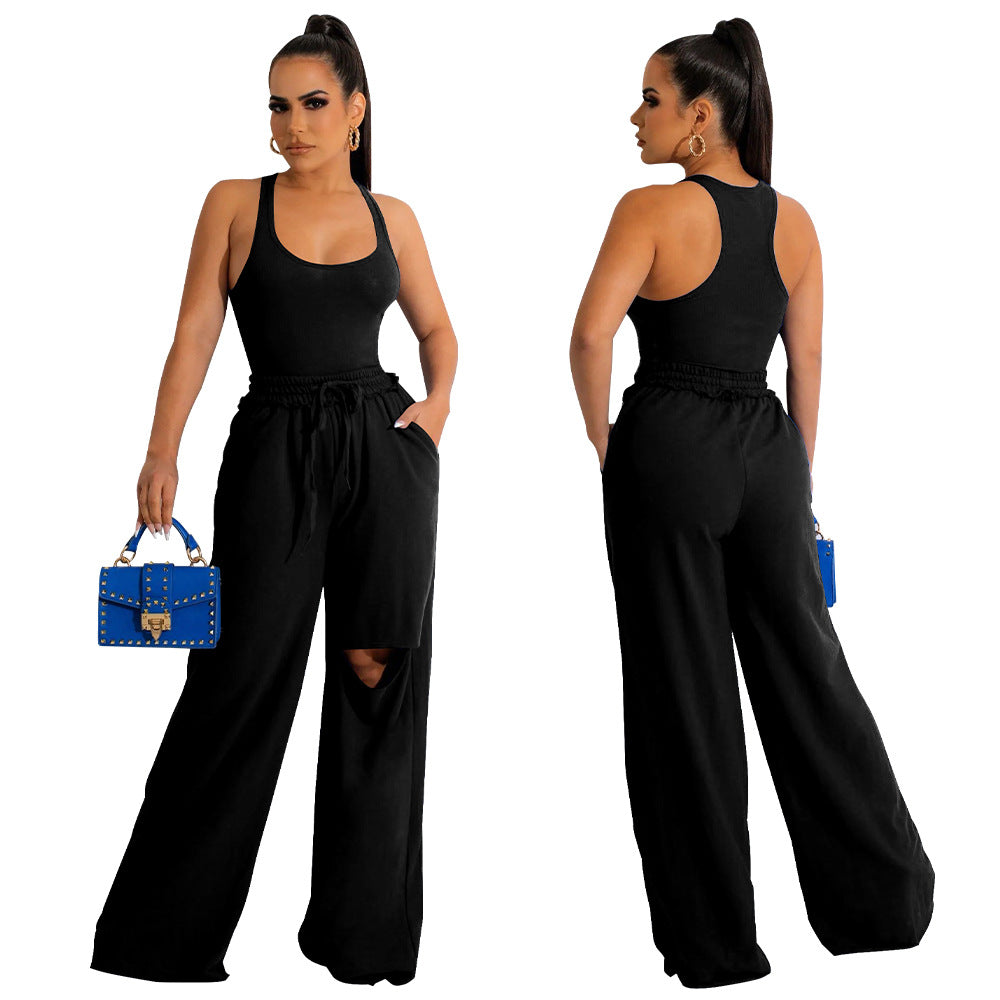 Dame Sporty Jumpsuit med høj talje og innovativ slidsdesign Stilla