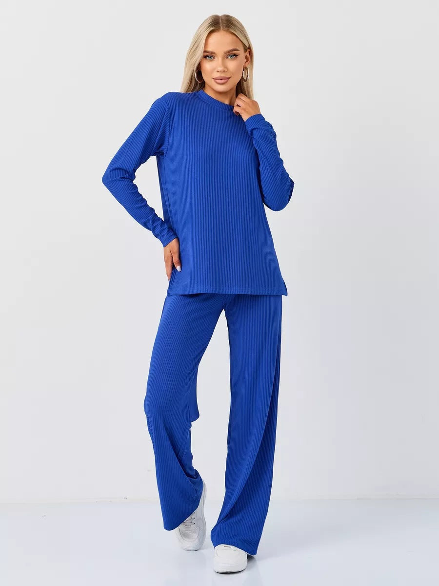 Dame cropped Langærmet skjorte med moderne knude design og fin rib struktur Stilla