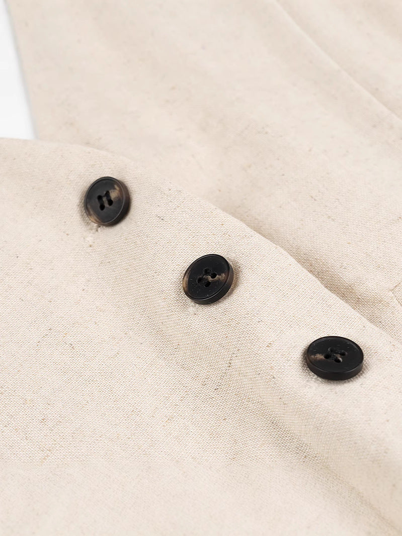Dame jumpsuit med elegant V-udskæring og raffinerede knapdetaljer Stilla